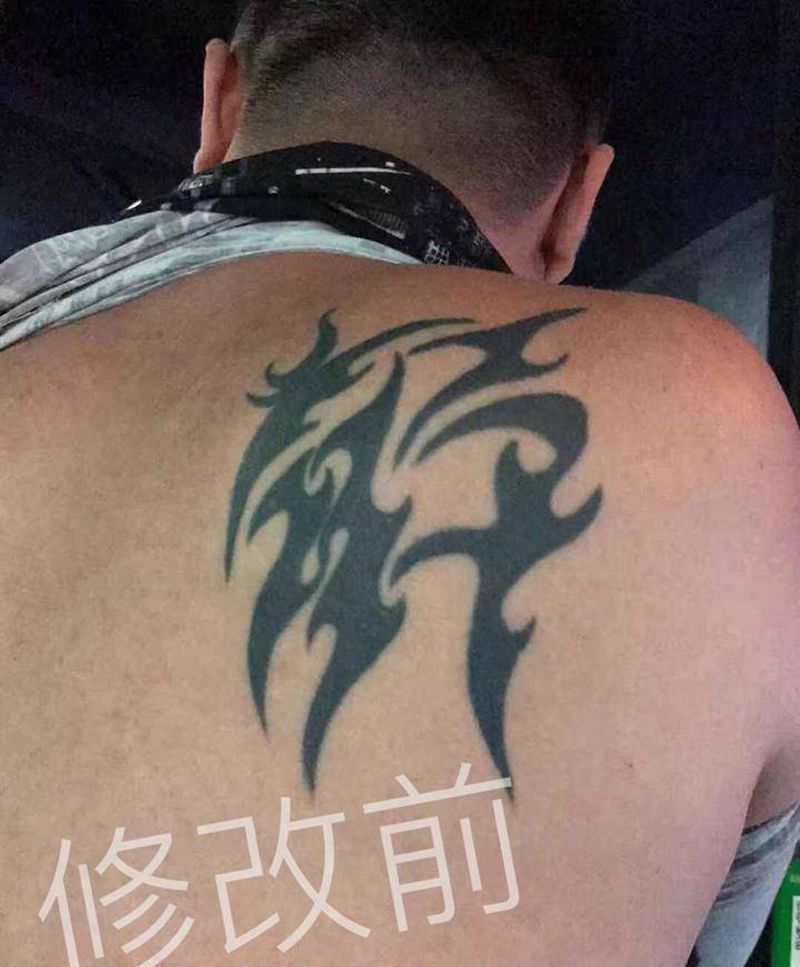 啸纹身图片_背部欧美写实新传统纹身图案