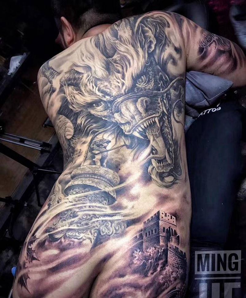 龙游华夏纹身图片_背部臀部新传统纹身图案