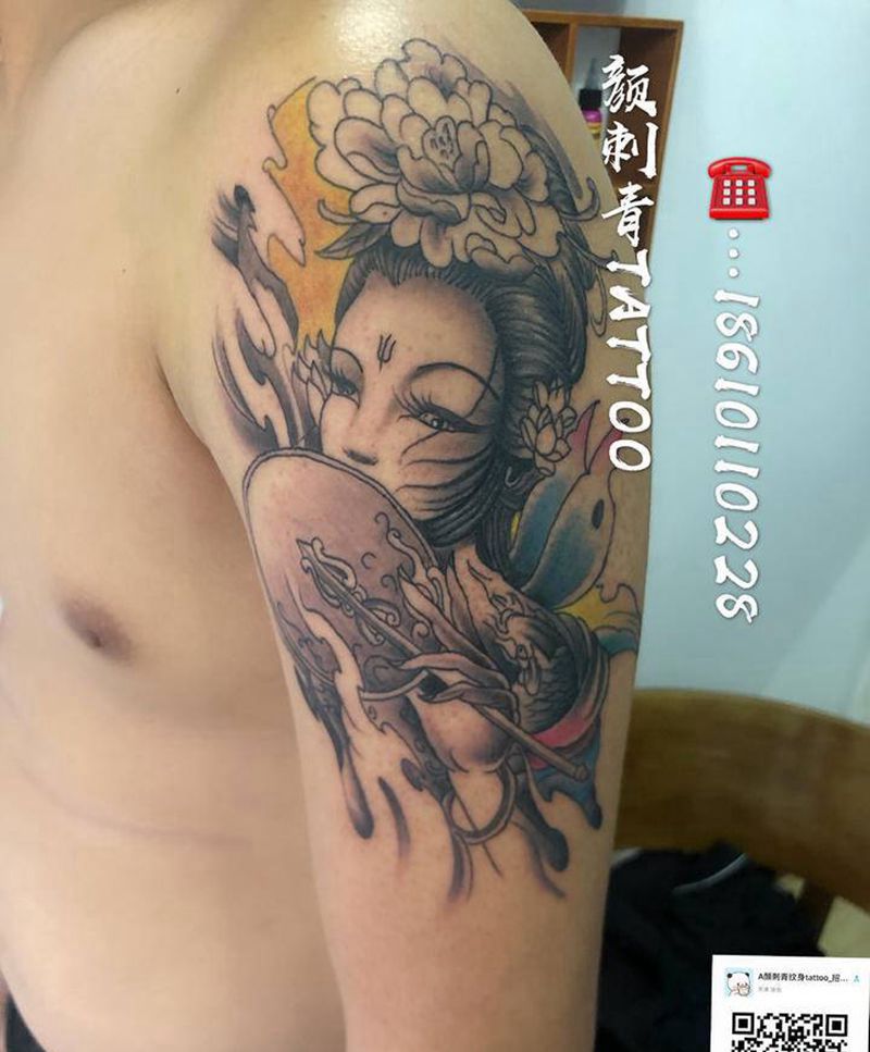 大臂艺妓纹身图片_手臂纹身图案