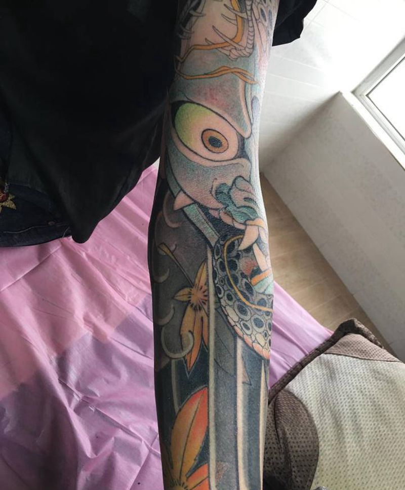 遥相呼应纹身图片_手臂腿部老传统新传统鱼班若蛇纹身图案