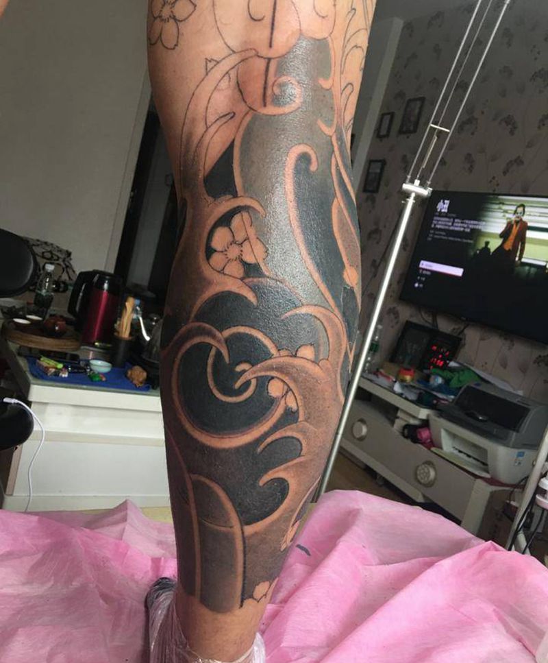 今日花腿进度纹身图片_腿部老传统浪花纹身图案
