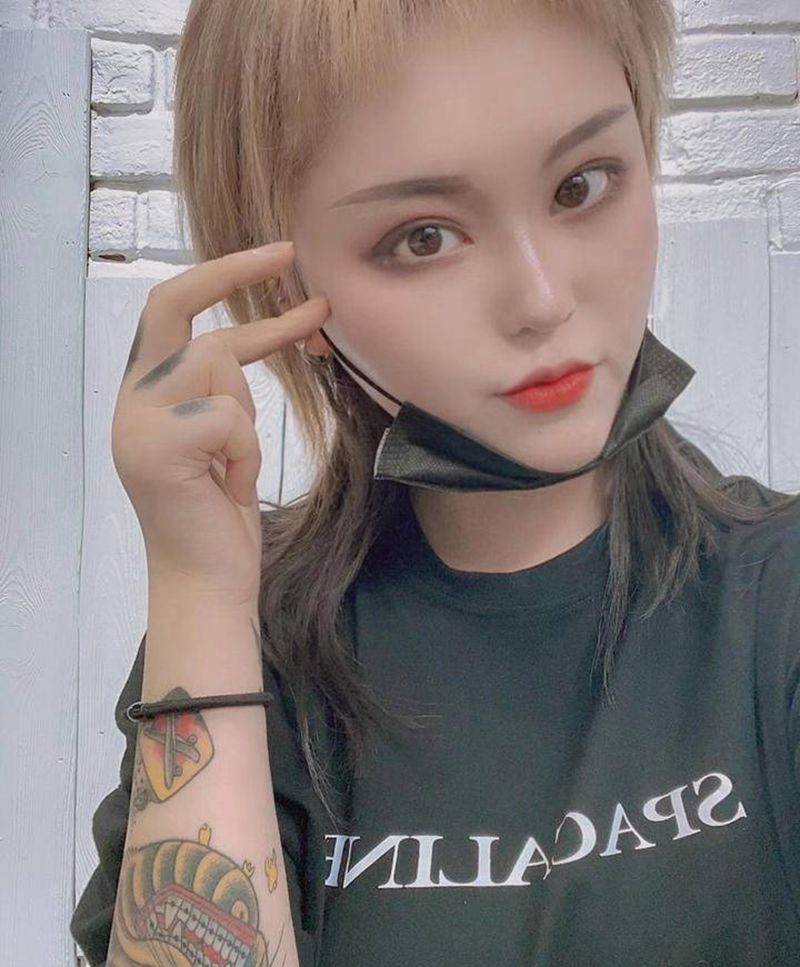 秀纹身图片_手臂New School纹身图案