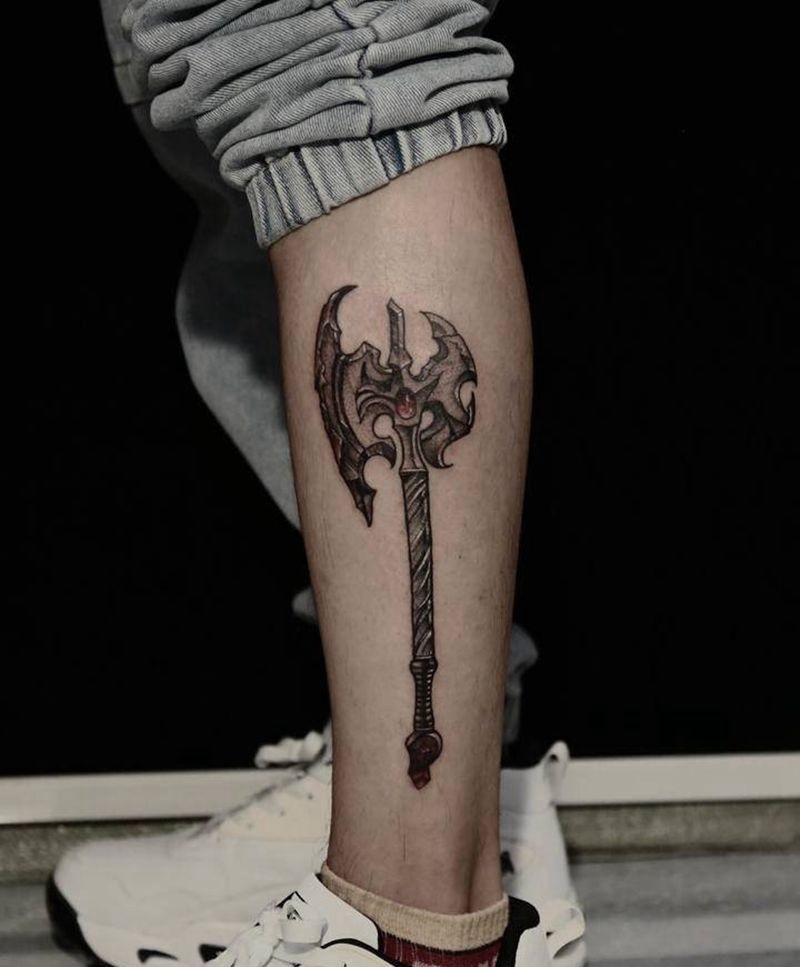 斧头纹身图片_腿部新传统欧美写实纹身图案