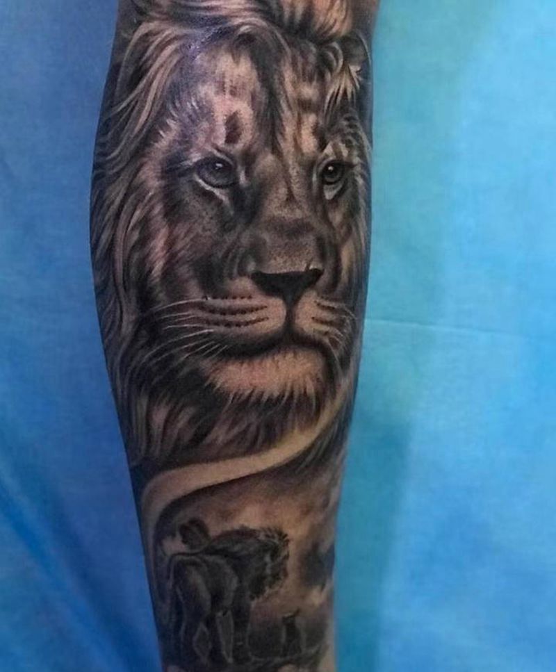 欧美狮子纹身图片_腿部脚部欧美写实纹身图案