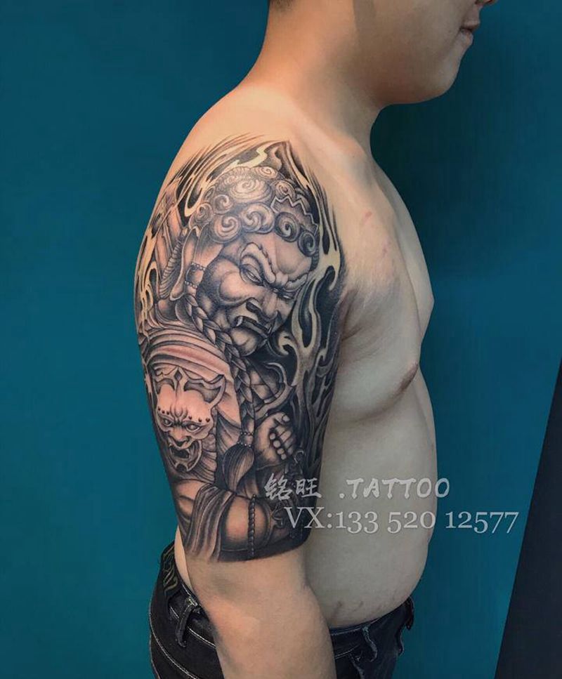 不动冥王纹身图片_手臂老传统纹身图案