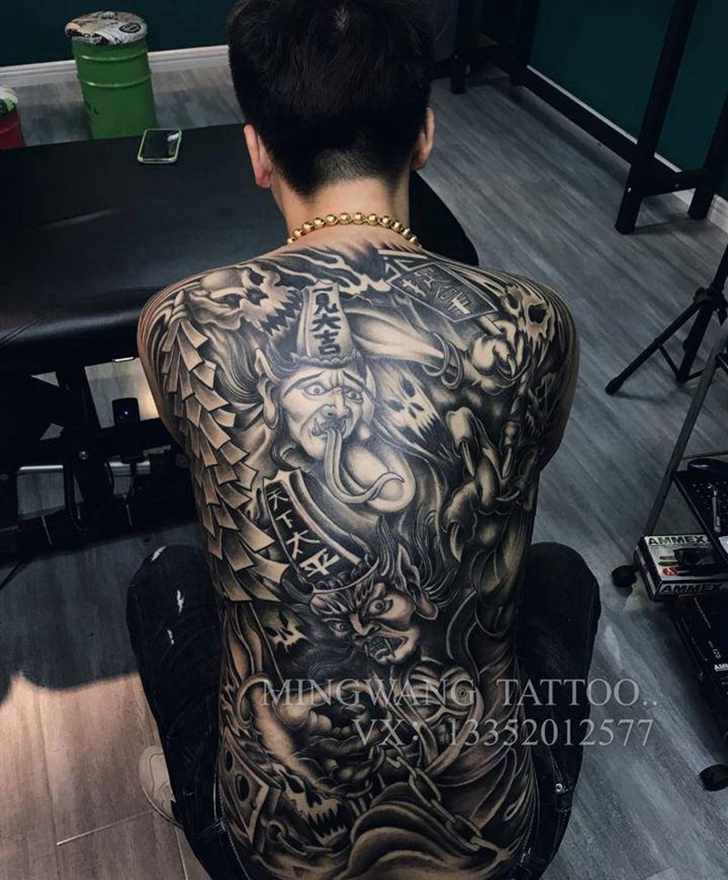 黑白无常纹身图片_背部老传统纹身图案