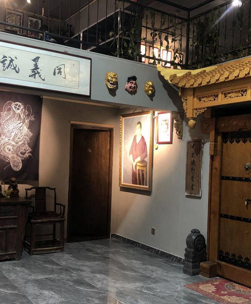 新店一角纹身图片_背部老传统纹身图案