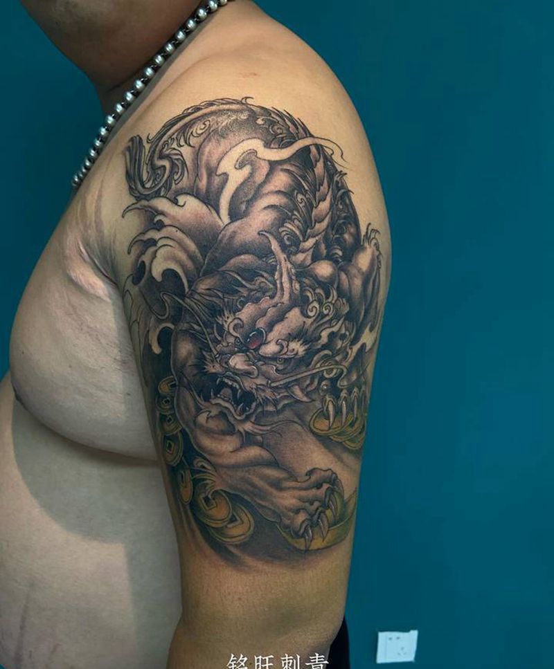 貔貅纹身图片_手臂老传统纹身图案