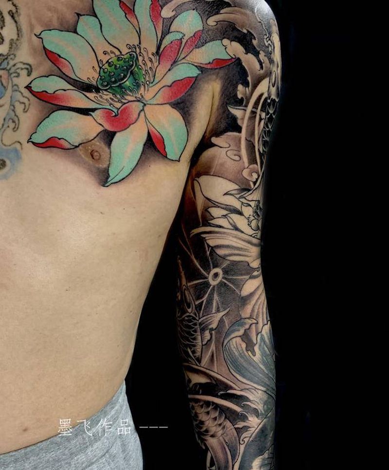 花臂鱼荷花纹身图片_手臂胸部纹身图案