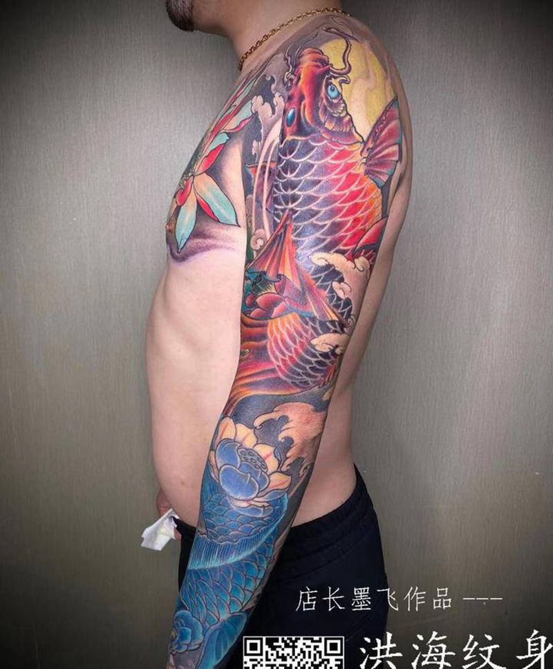 修改遮盖-荷花-鱼纹身图片_胸部手臂新传统纹身图案