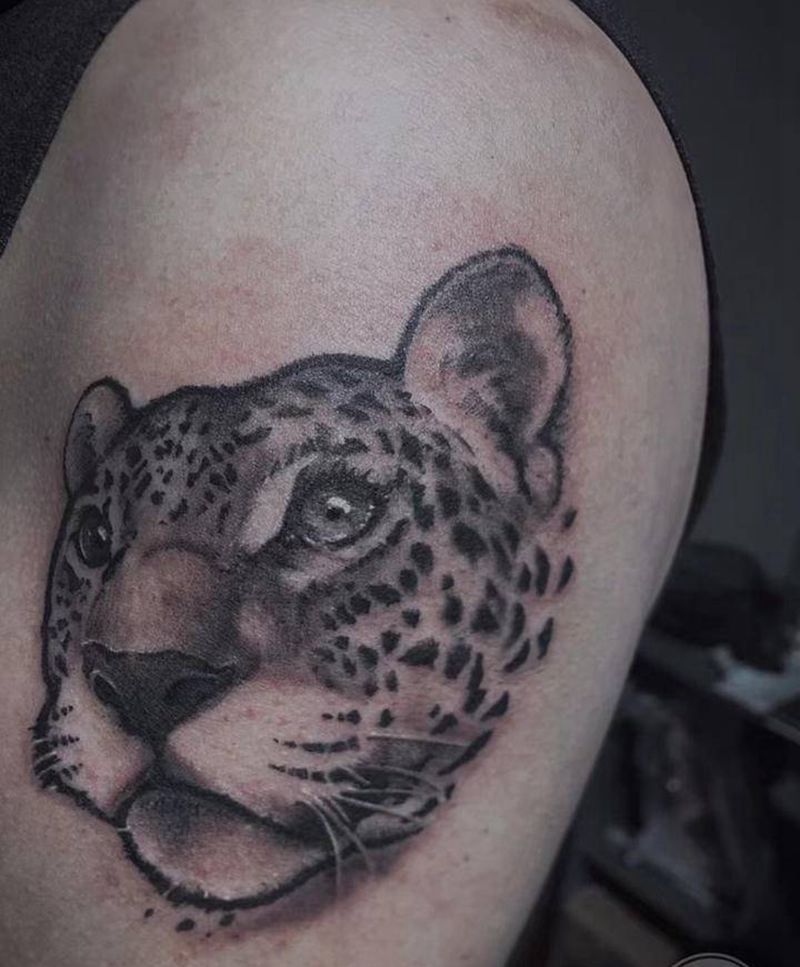 小猎豹遮盖纹身纹身图片_手臂欧美写实猎豹豹子纹身图案