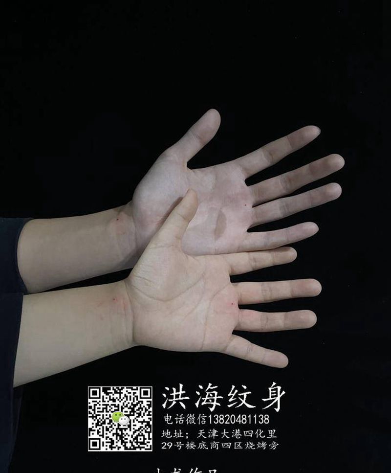 朱砂痣纹身图片_手部纹身图案