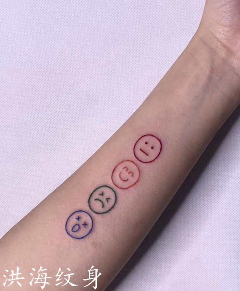 笑脸纹身图片_手臂纹身图案
