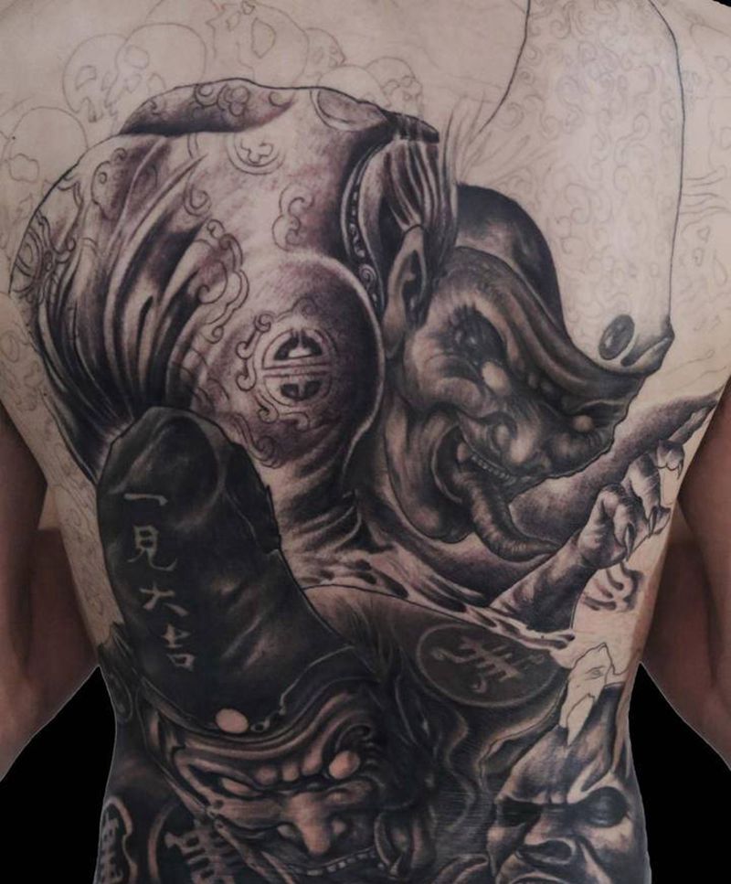 黑白无常未完纹身图片_背部老传统新传统纹身图案
