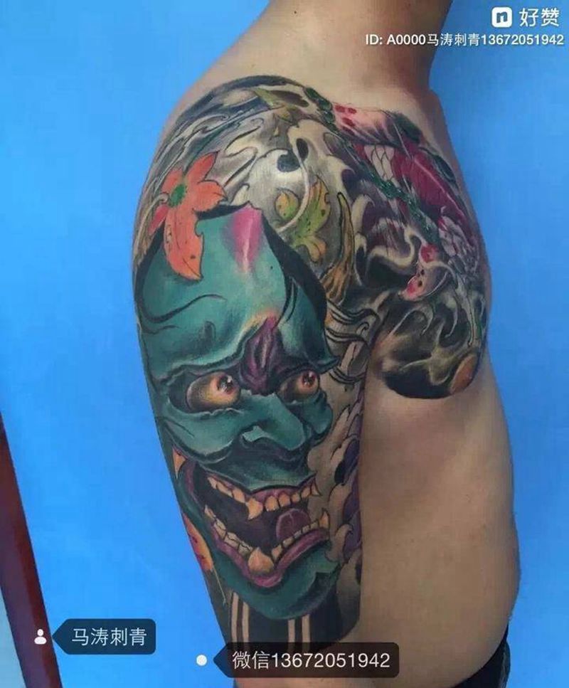 半甲鱼与般若纹身图片_