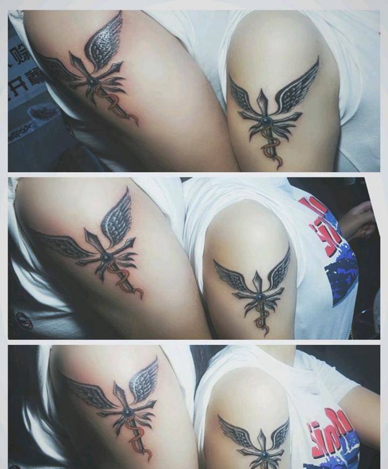 情侣翅膀纹身图片_手臂图腾纹身图案