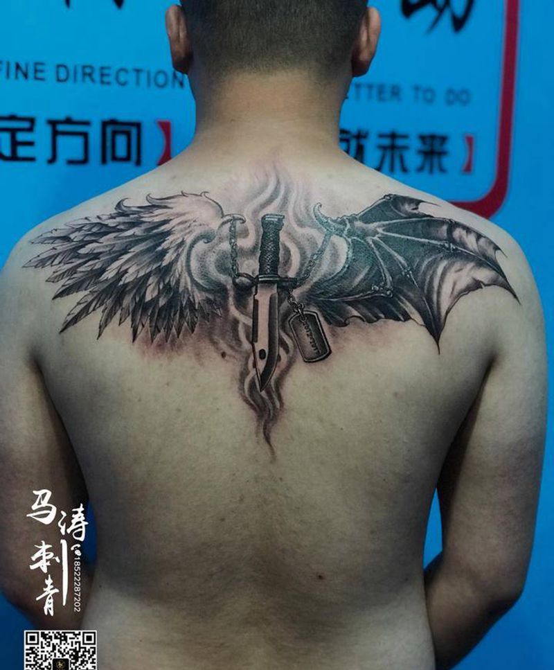天使与恶魔纹身图片_背部新传统欧美写实纹身图案