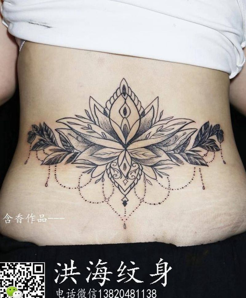 素花纹身图片_腰部点刺纹身图案