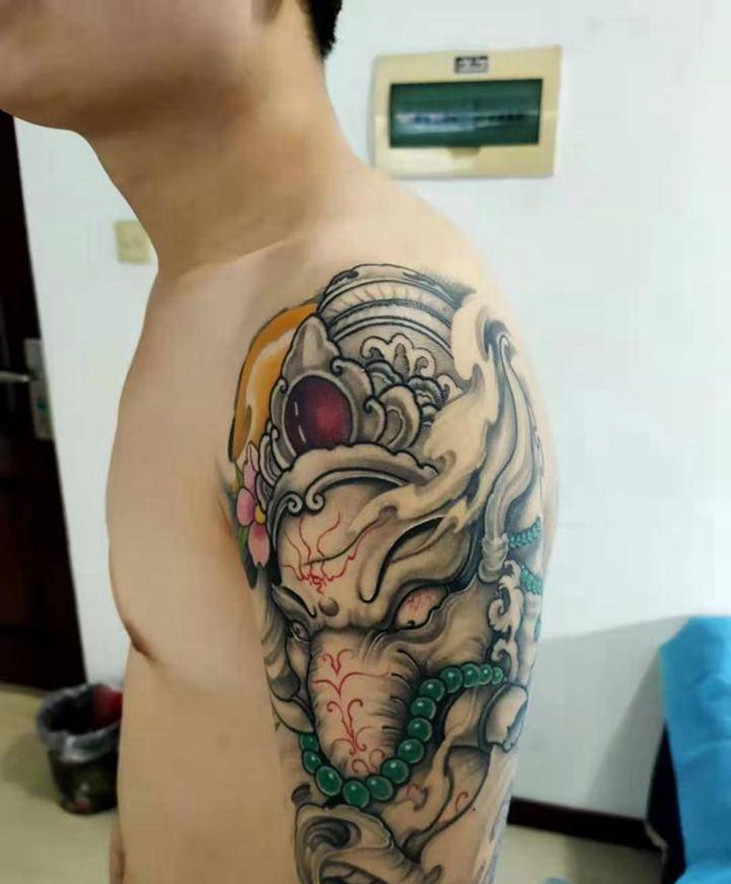 象神恢复后纹身图片_手臂新传统纹身图案