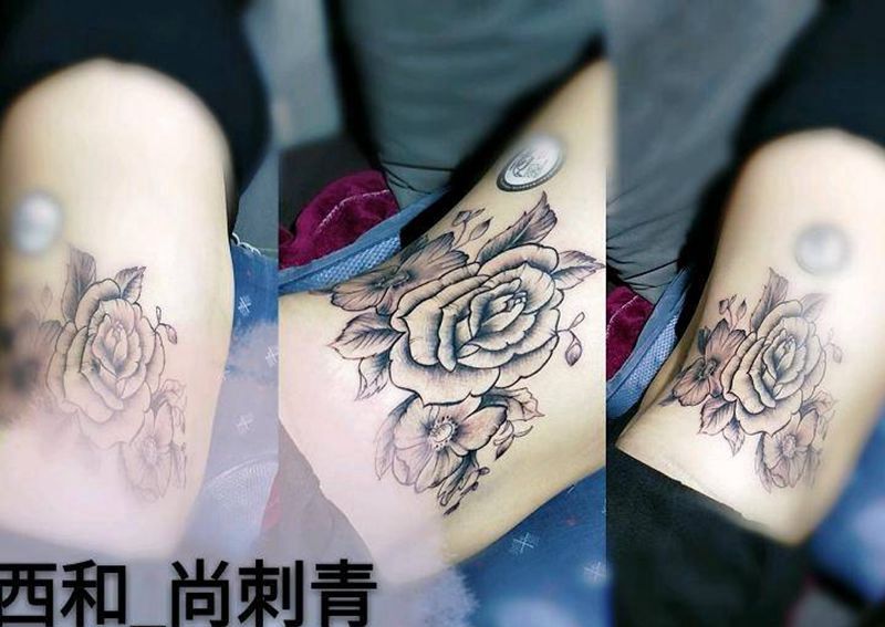 花纹身图片_腰部新传统纹身图案