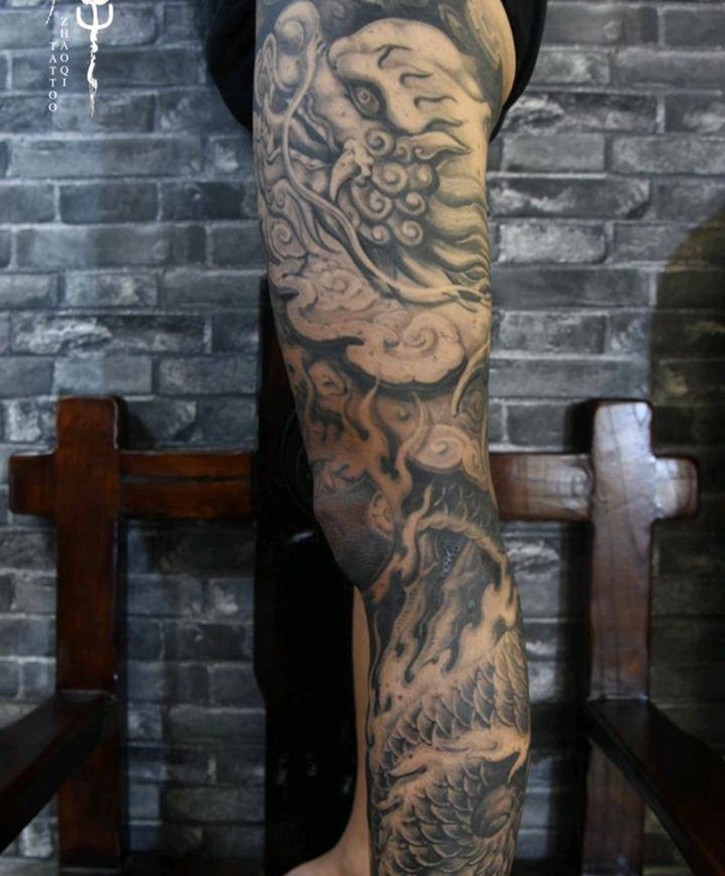 雕龙腿Ⅱ纹身图片_腿部欧美写实新传统石雕龙龙石雕纹身图案