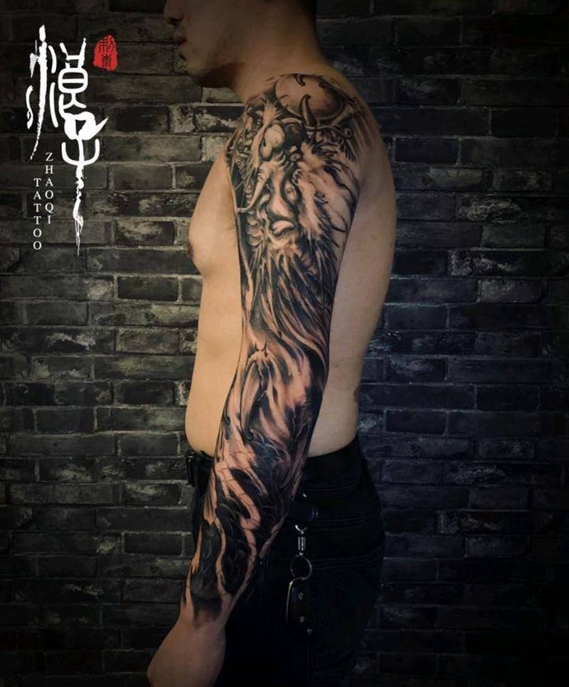 祥龙纹身图片_手臂新传统龙牡丹纹身图案