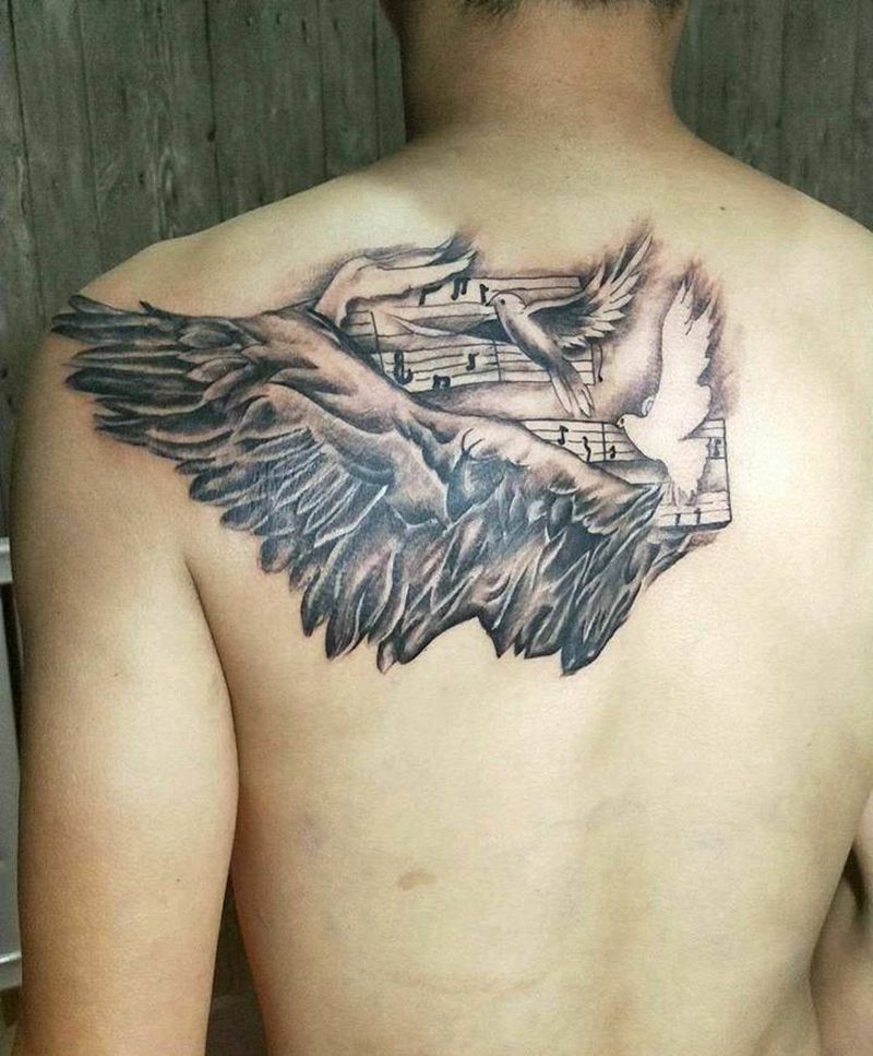 和平翅膀纹身图片_