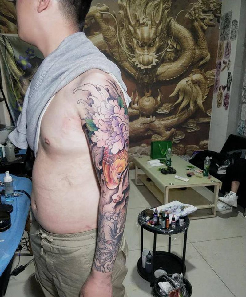 般若鱼花臂纹身图片_手臂新传统纹身图案