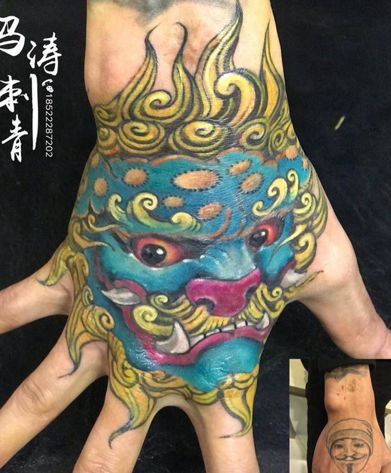 手面唐狮遮盖纹身图片_手部传统成品动物原创纹身图案