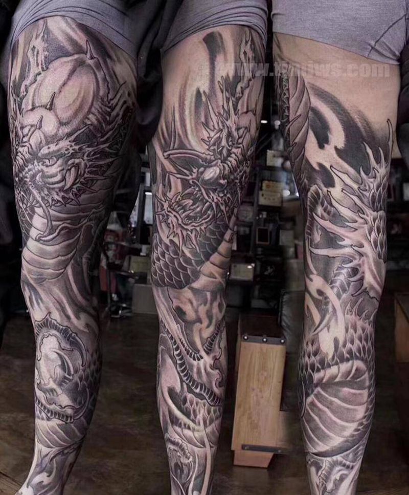 龙盘腿纹身图片_