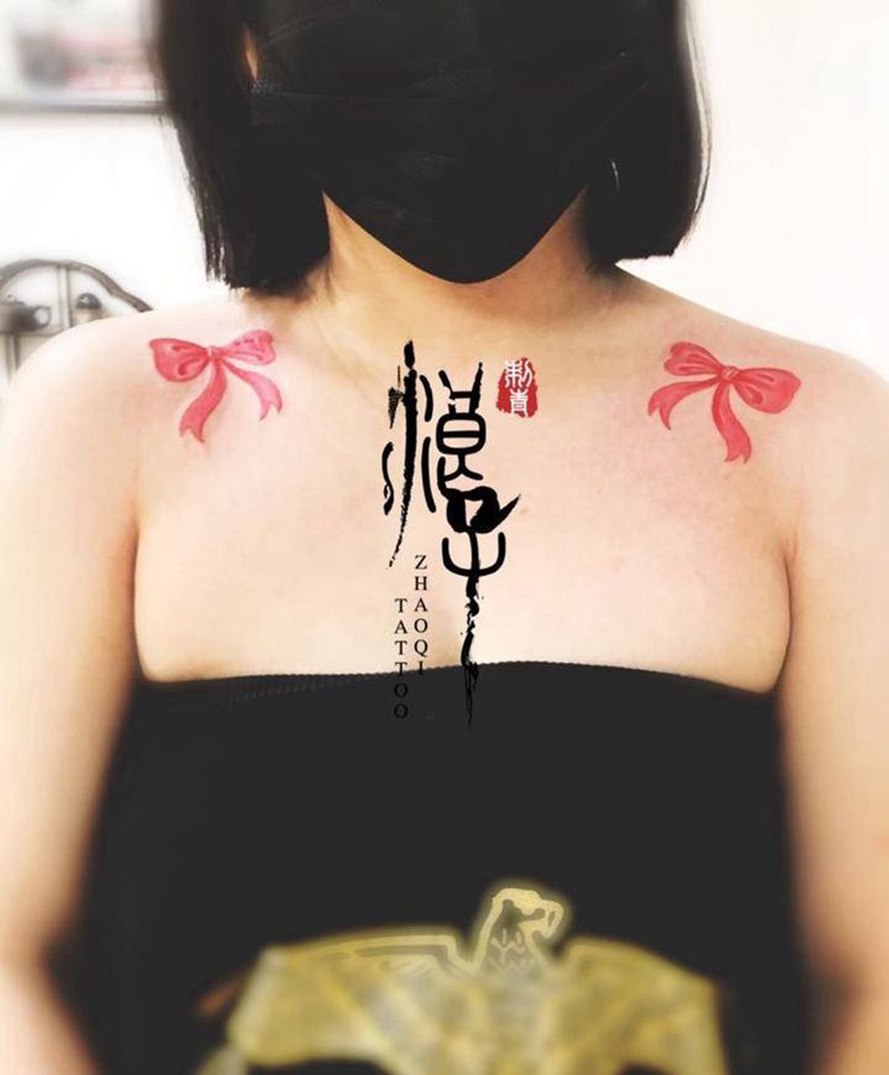 美女蝴蝶结纹身图片_肩部水彩水墨纹身图案