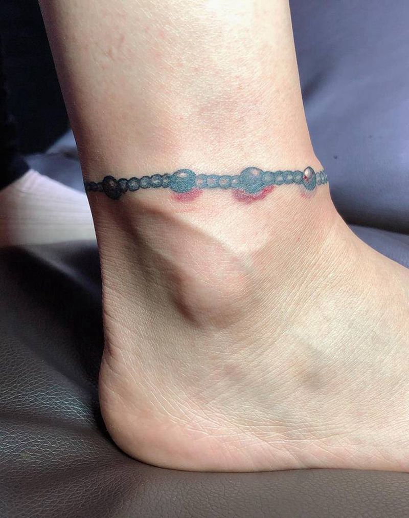 脚链纹身图片_脚部老传统纹身图案