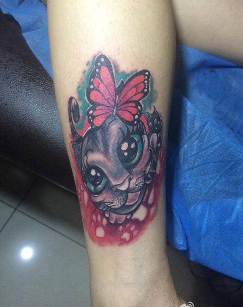 猫咪纹身图片_腿部写实动物纹身图案