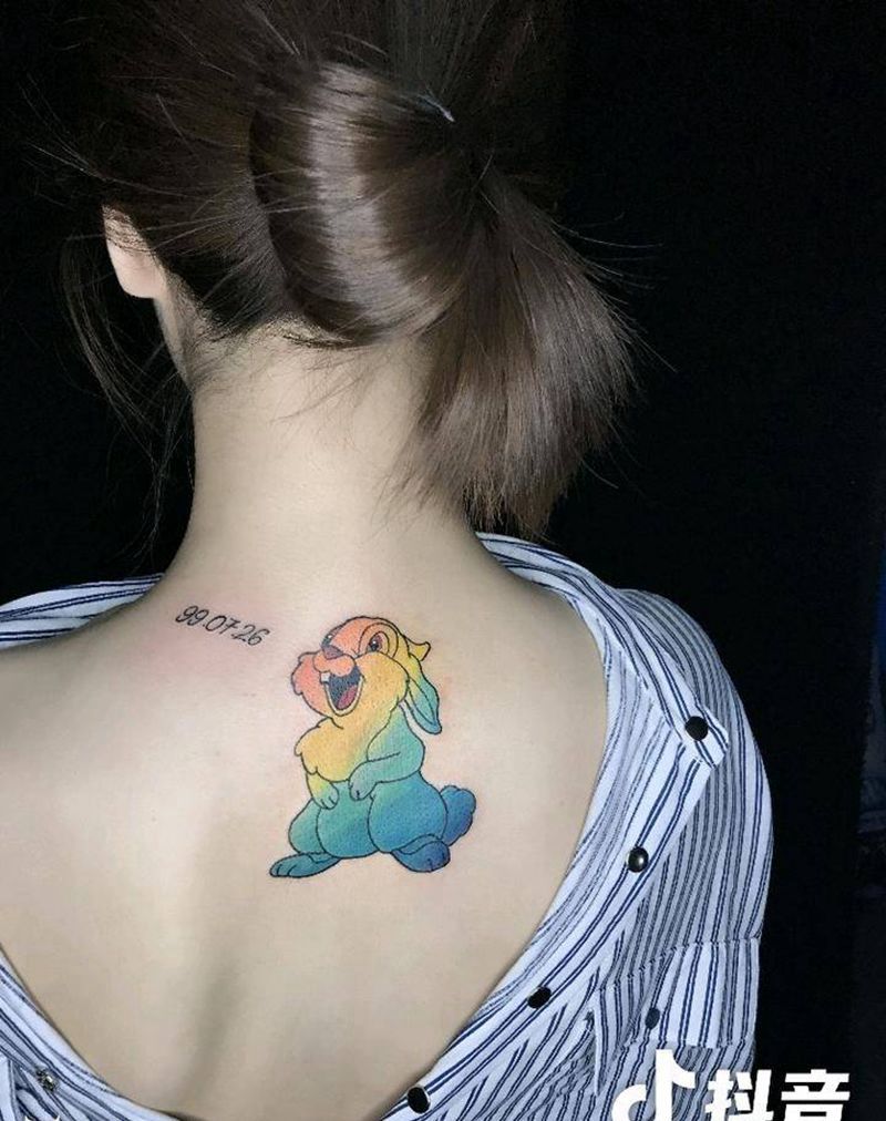 爱笑的兔兔纹身图片_背部颈部New School水彩兔纹身图案