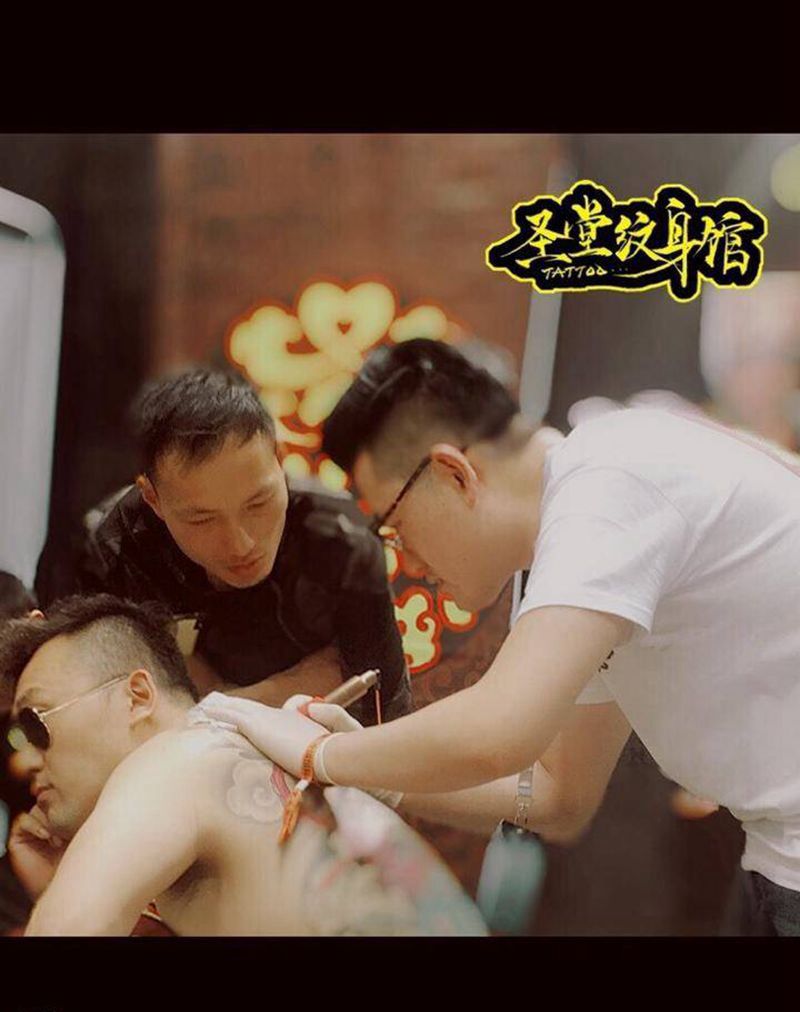 展会工作照纹身图片