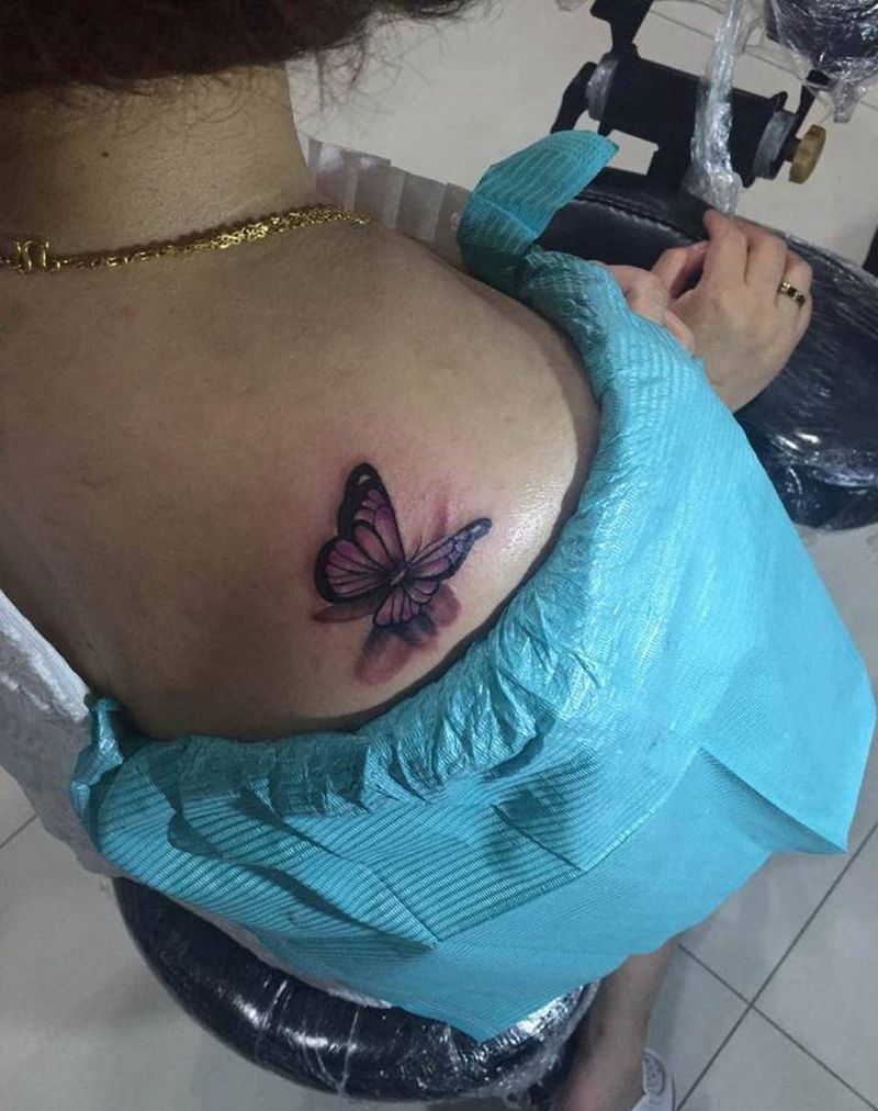 小蝴蝶鲜花纹身图片