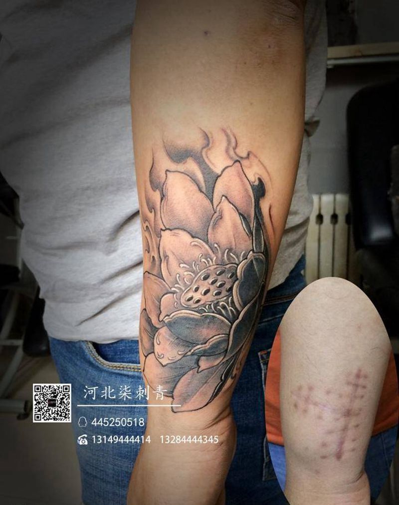 莲花遮盖疤痕纹身图片_成品手臂传统植物纹身图案