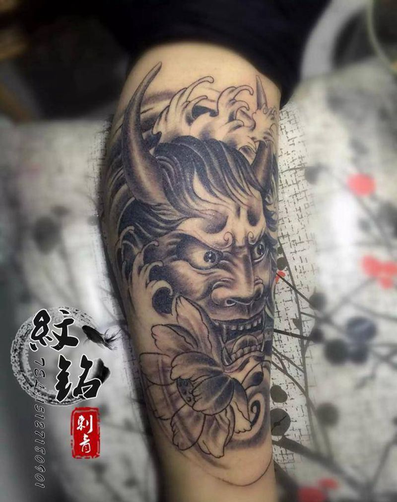 小腿般诺纹身图片