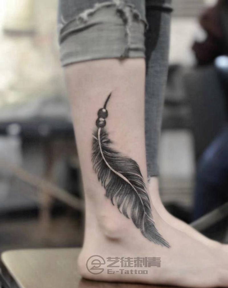 羽毛纹身图片_脚部纹身图案