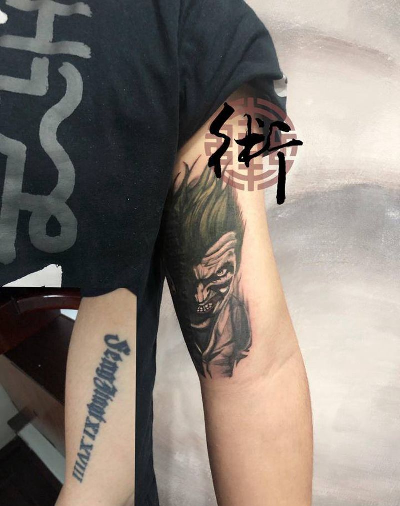 遮盖小丑纹身图片_手臂欧美写实小丑纹身图案