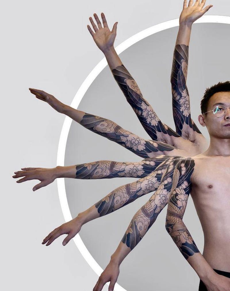 千手鱼花臂纹身图片_手臂老传统纹身图案