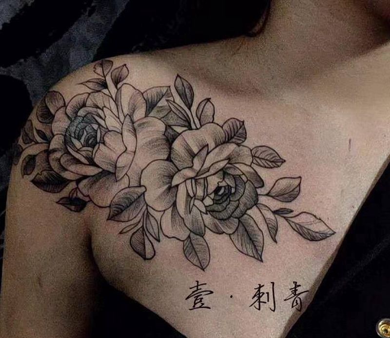 素花纹身图片_胸部点刺纹身图案