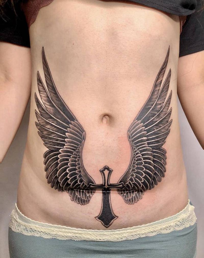 剖腹产遮盖纹身图片_腹部腰部欧美写实New School纹身图案