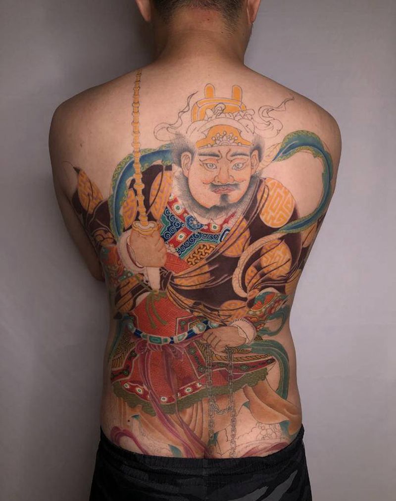 武财神进度纹身图片_背部臀部老传统纹身图案