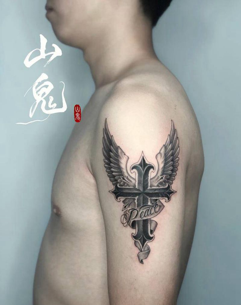 ✝️&翅膀纹身图片_手臂欧美写实纹身图案