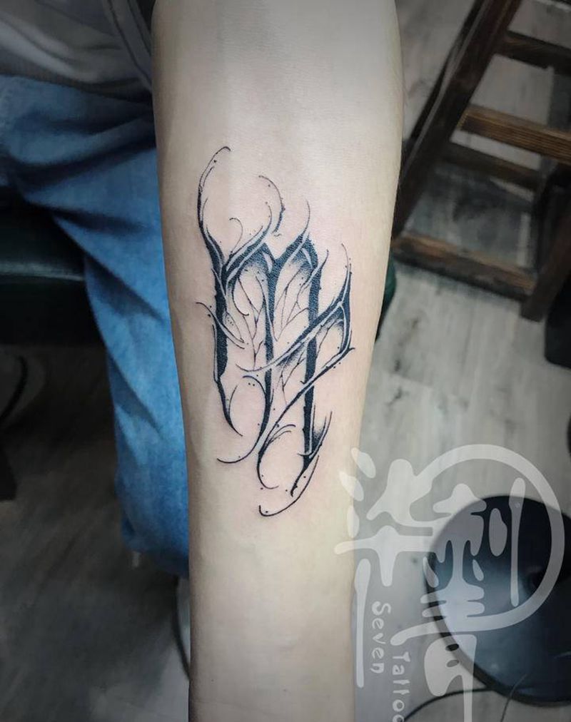 花体字纹身图片_手臂花体字纹身图案