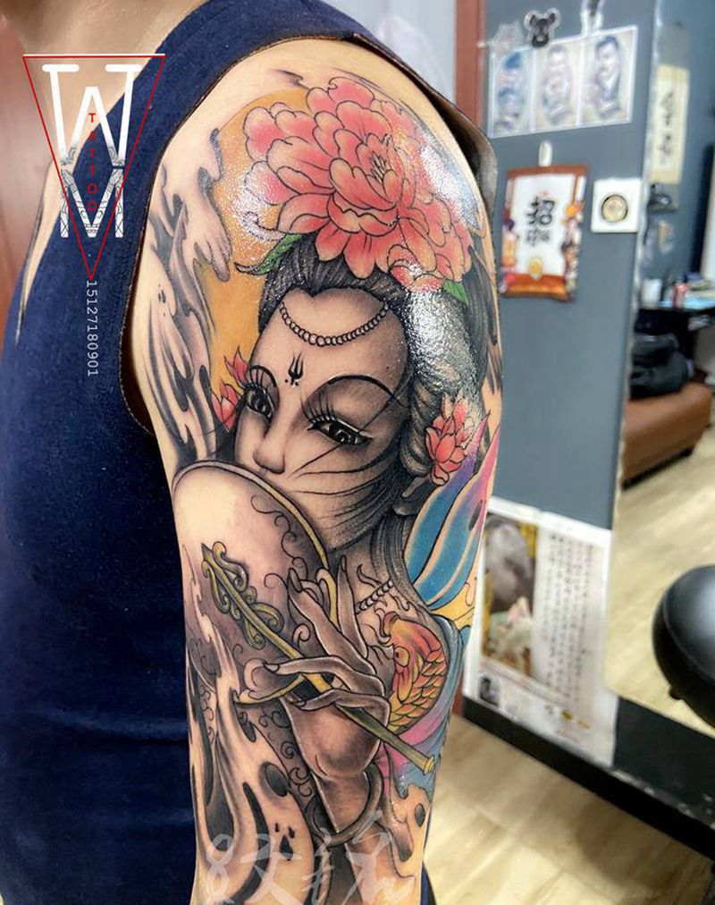 大臂艺伎纹身图片_手臂纹身图案