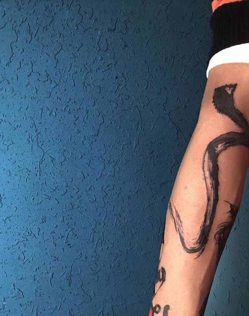 汉子（了）纹身图片_手臂水墨汉子纹身图案