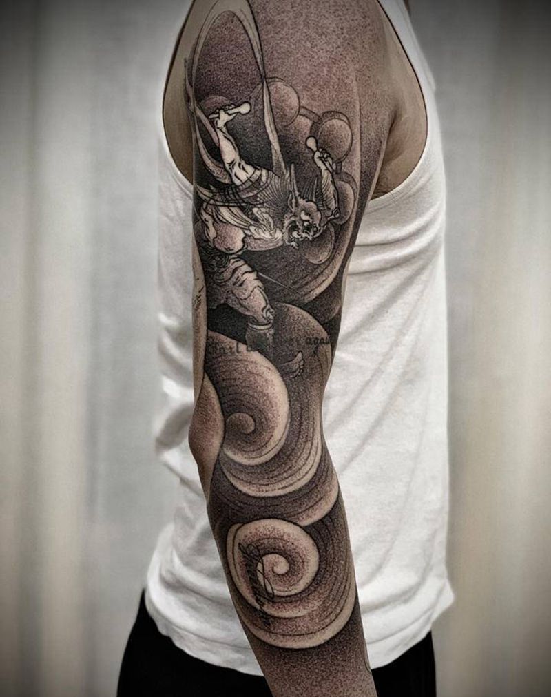 风雷纹身图片_手臂点刺纹身图案