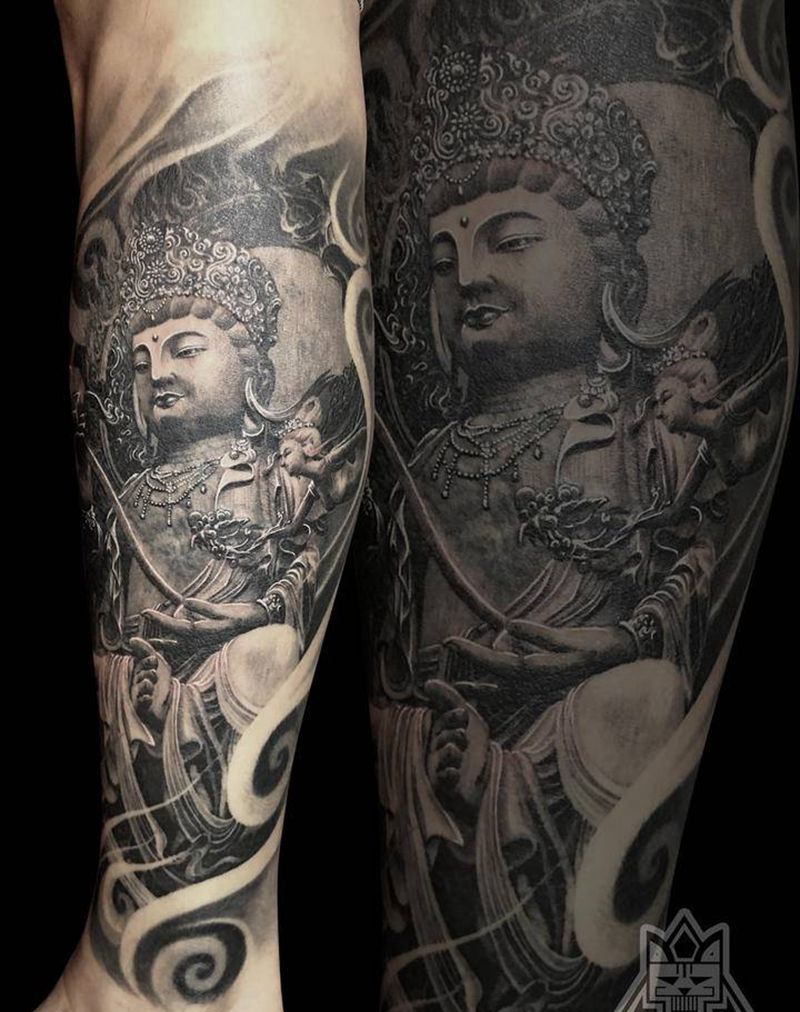 文殊菩萨纹身图片_腿部欧美写实文殊菩萨纹身图案